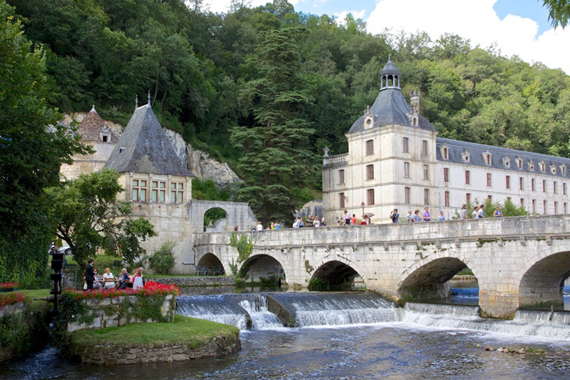 The Abbaye de Brantôme and its stone bridge over the Dronne river